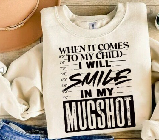 When it comes to my child I will smile in my mugshot